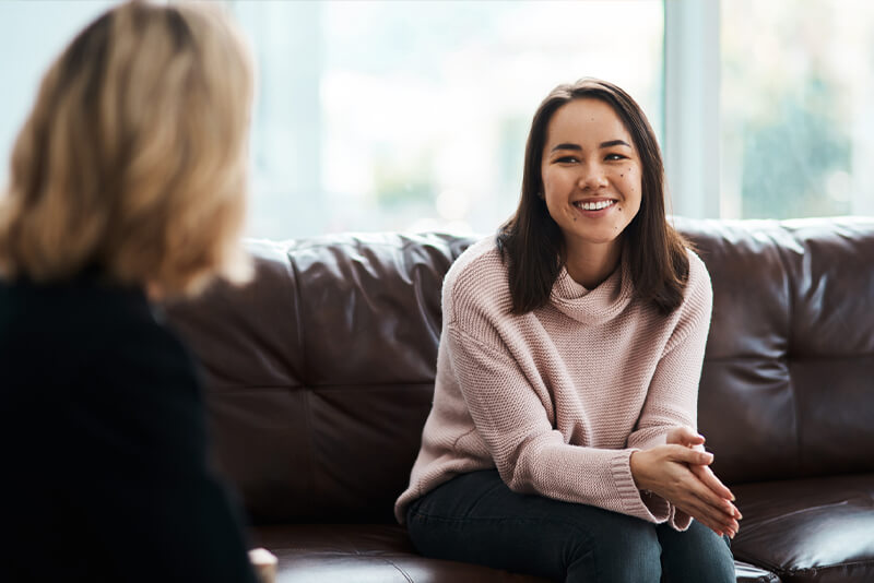 two woman talking